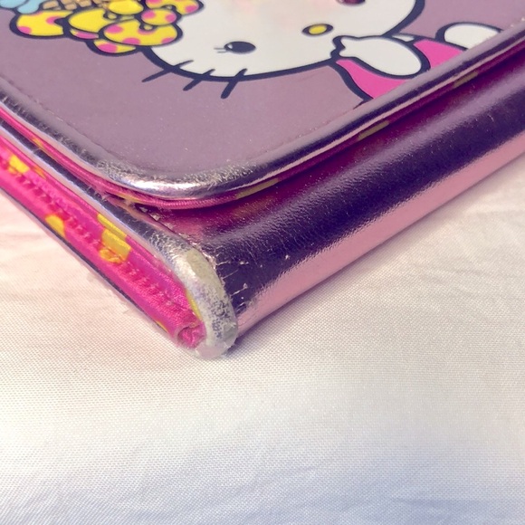 HELLO KITTY metallic pink wallet. Holds up to 16 cards. Polka dot lining inside. - Picture 6 of 16